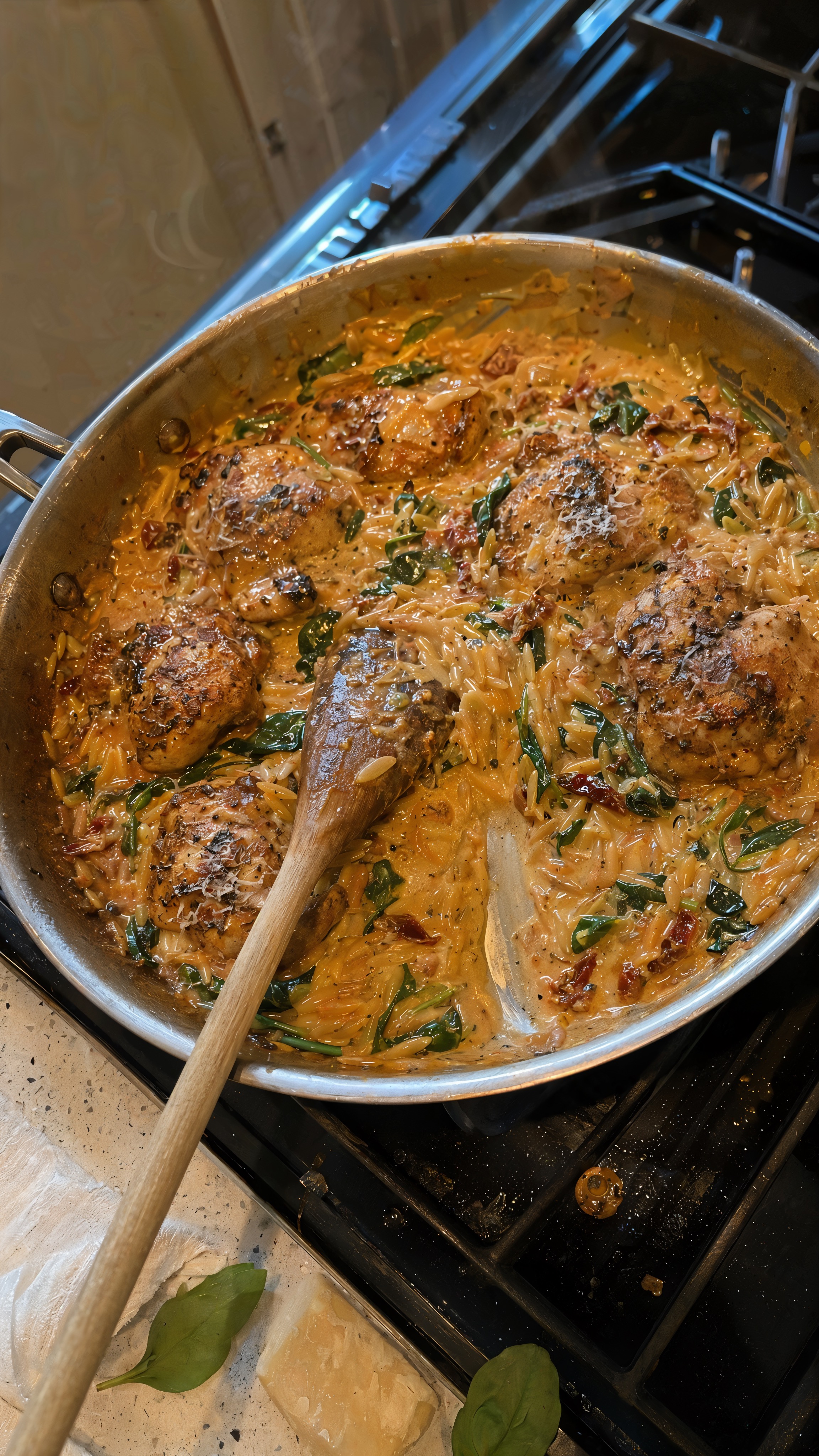One-pan chicken orzo with sun-dried tomatoes in a creamy skillet sauce